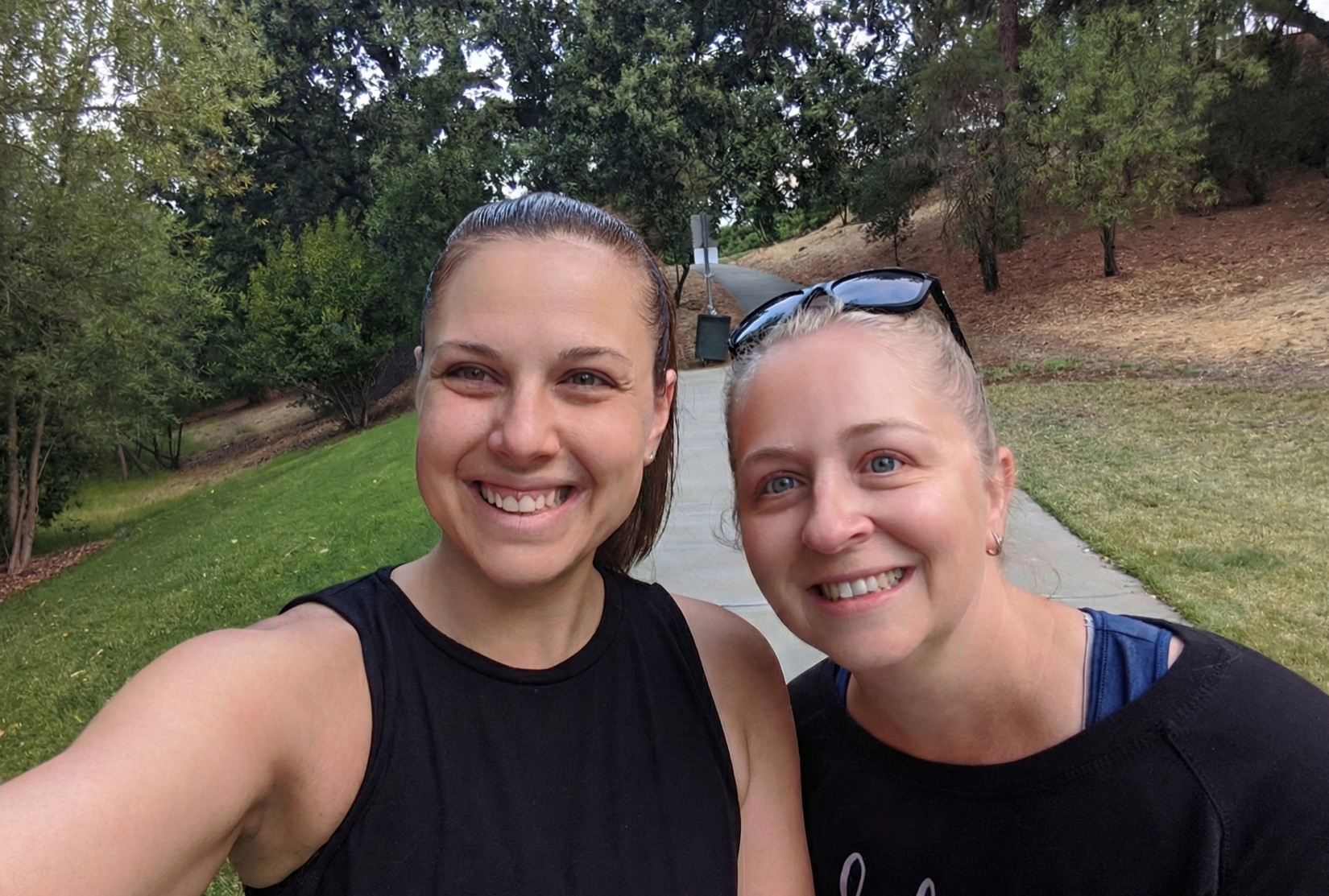 Co-founders Tara and Morgan smiling together in an outdoor selfie
